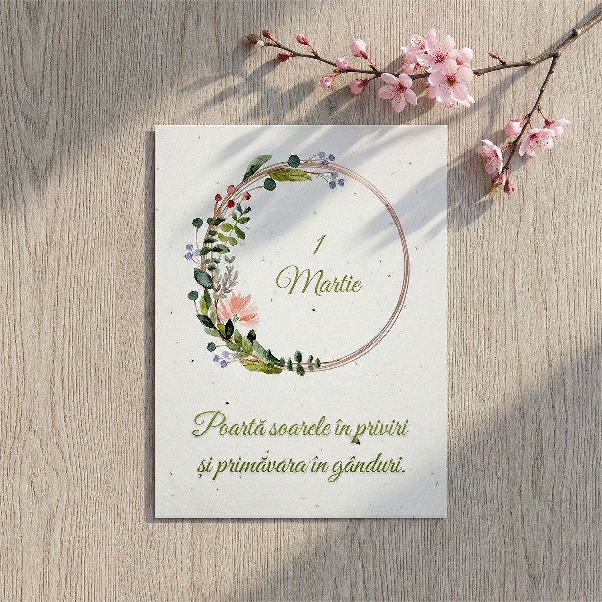 Felicitare cu mesaj poarta soarele in priviri si snur de martisor asezata artistic