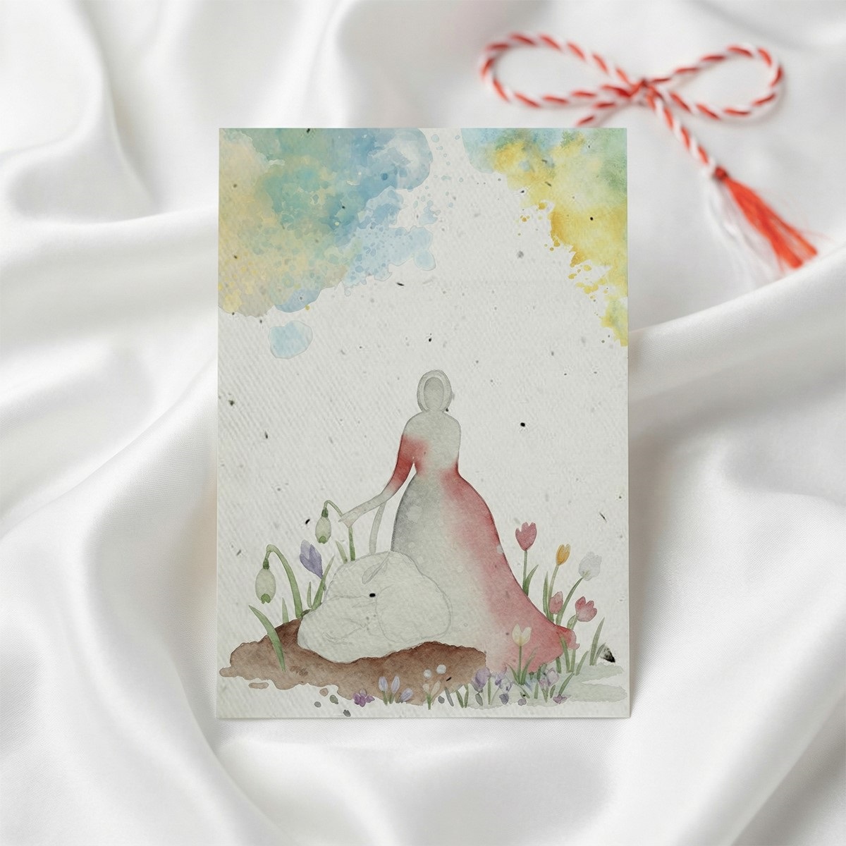 Ilustratie Baba Dochia odihnindu-se langa o mioara alba pictata in acuarela pe hartie plantabila